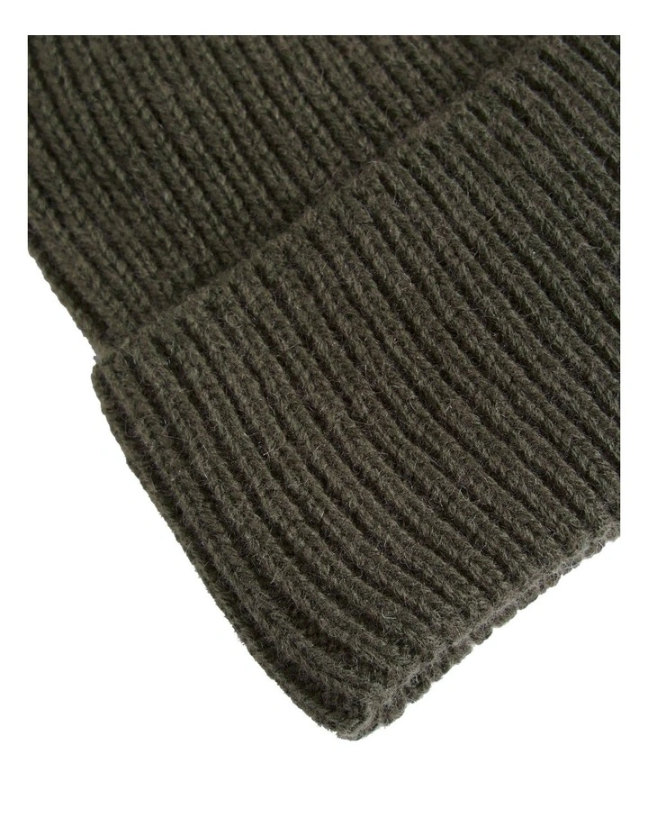 Pom Pom Beanie In Dark Fern 2 Pom Pom Beanie In Dark Fern - Image 2